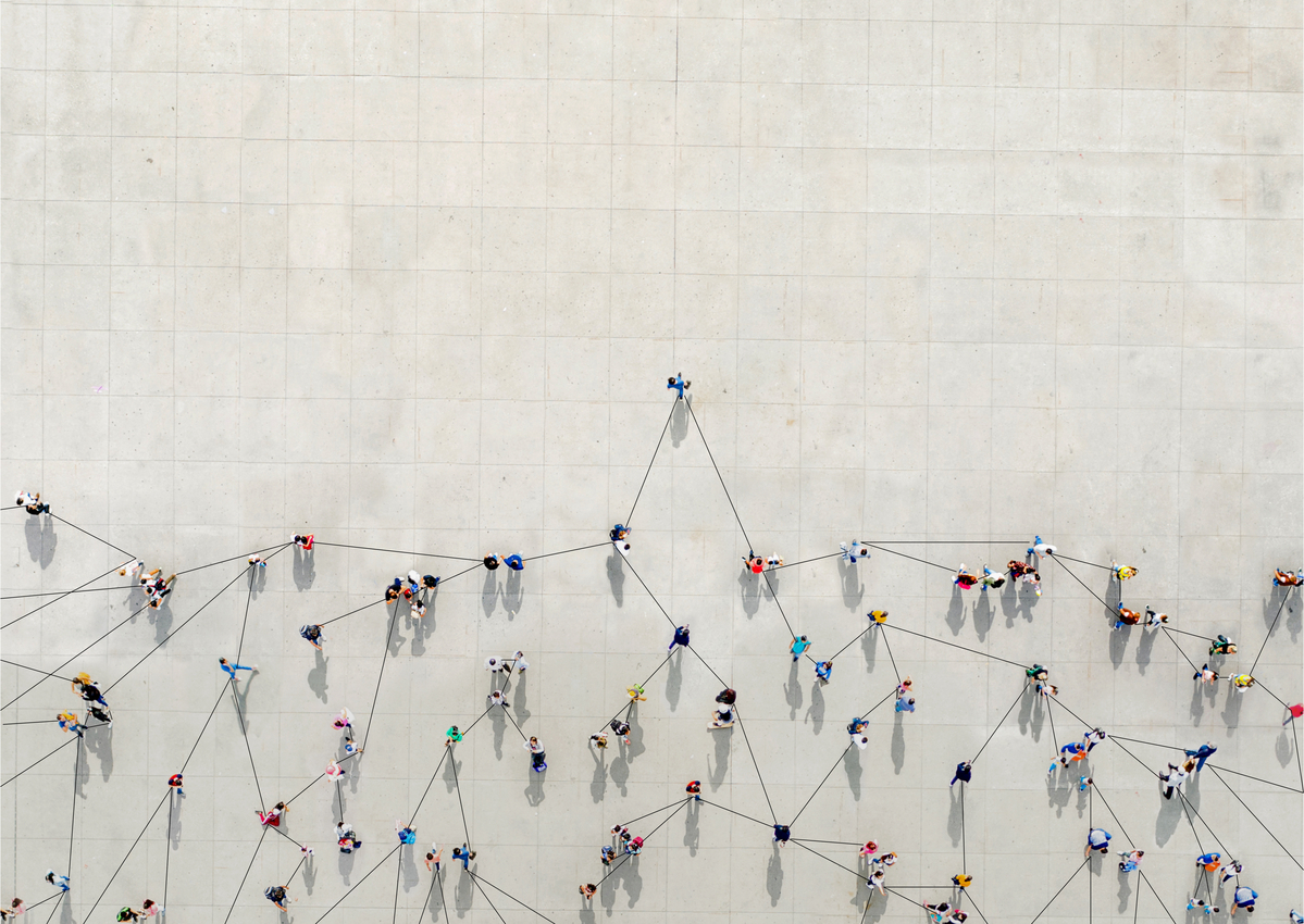 People standing on concrete with lines connecting each other like a network
